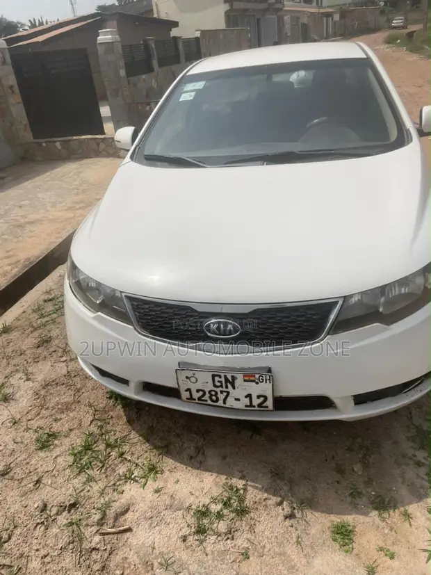 Kia Cerato 2011 White - 1