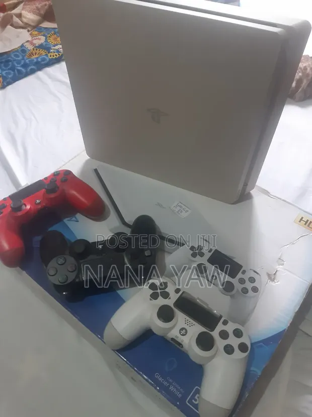 PS4 Slim with 4 Controllers and 6 Games - 1