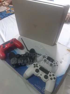 PS4 Slim with 4 Controllers and 6 Games
