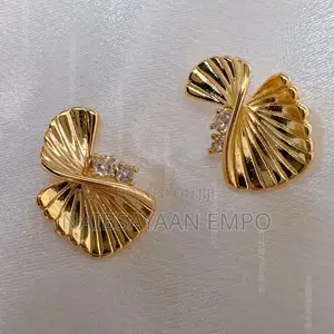 Gold Twisted Shape Pendant Earrings