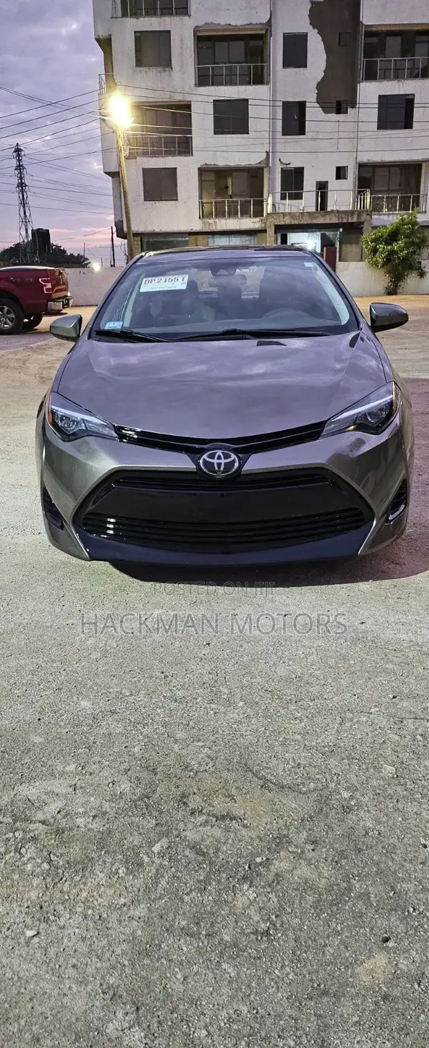 2018 Toyota Corolla LE (1.8L) Brown - 1