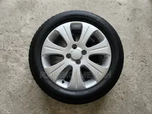 Used 205/55R15 Car Tyre with Silver Alloy Rim
