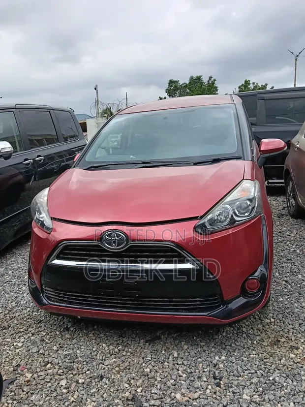 Toyota Sienta 1.5 AWD (6-seater) 2015 Red - 1
