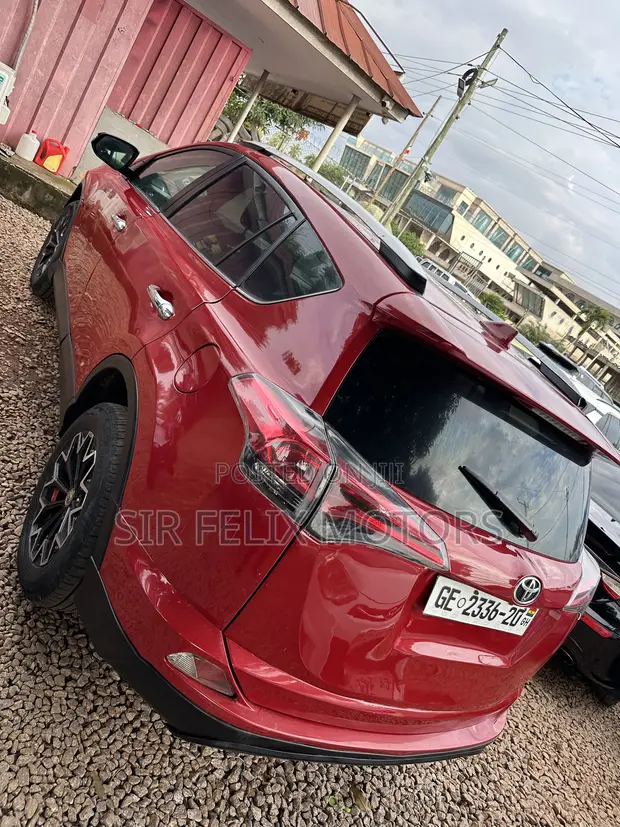 Toyota RAV4 LE 2018 Red SUV AWD - 1