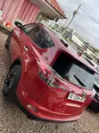 Toyota RAV4 LE 2018 Red SUV AWD - 1