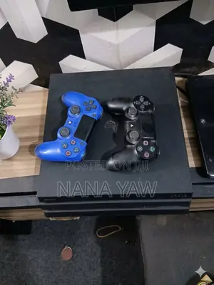 PS4 Pro with Two Original Controllers