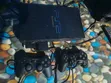 PlayStation 2 with 8 Games and 2 Controllers - 1