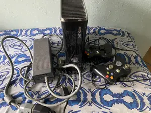 Xbox 360 with 2 Controllers and Games