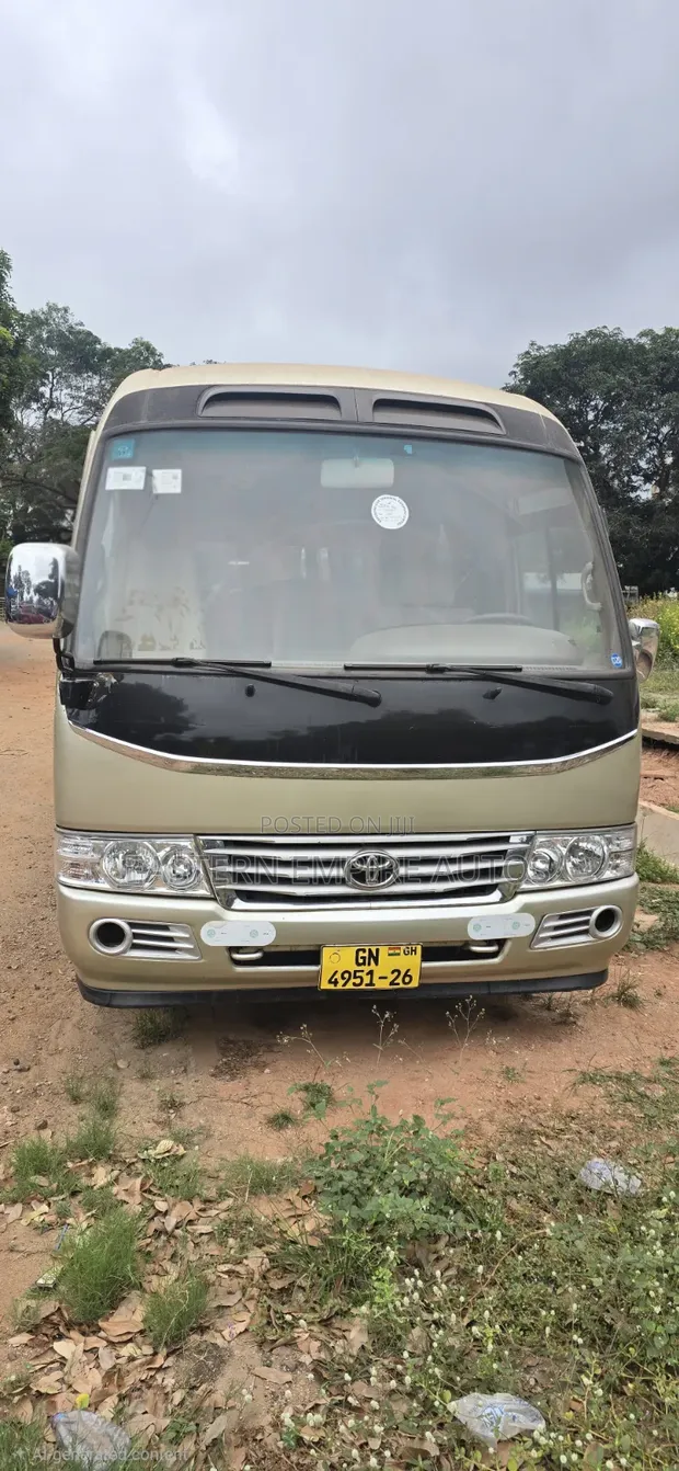 Toyota Coaster Bus 2016 - Gold - 1