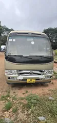 Toyota Coaster Bus 2016 - Gold - 1