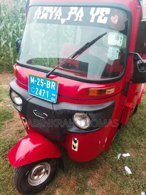 Bajaj RE 2025 Red Three-Wheeler