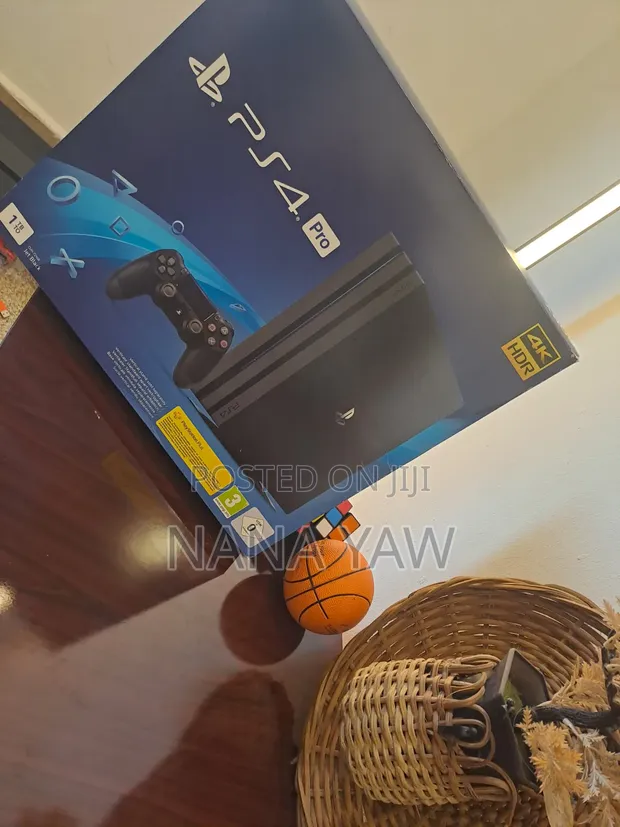 PS4 Pro 1 TB Console with 2 Controllers & Games - 1