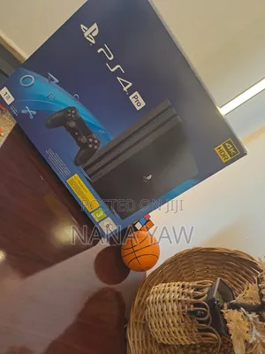 PS4 Pro 1 TB Console with 2 Controllers & Games