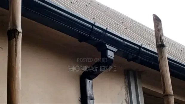 Black PVC Rain Gutter and Installation - 1