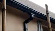 Black PVC Rain Gutter and Installation - 1