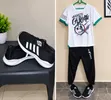 Men's Casual Wear Set: T-Shirts, Pants & Sneakers (Size M/42) - 1