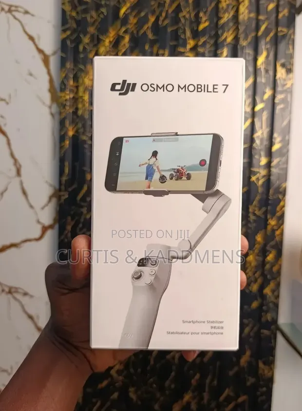DJI Osmo 7 Smartphone Gimbal - 1