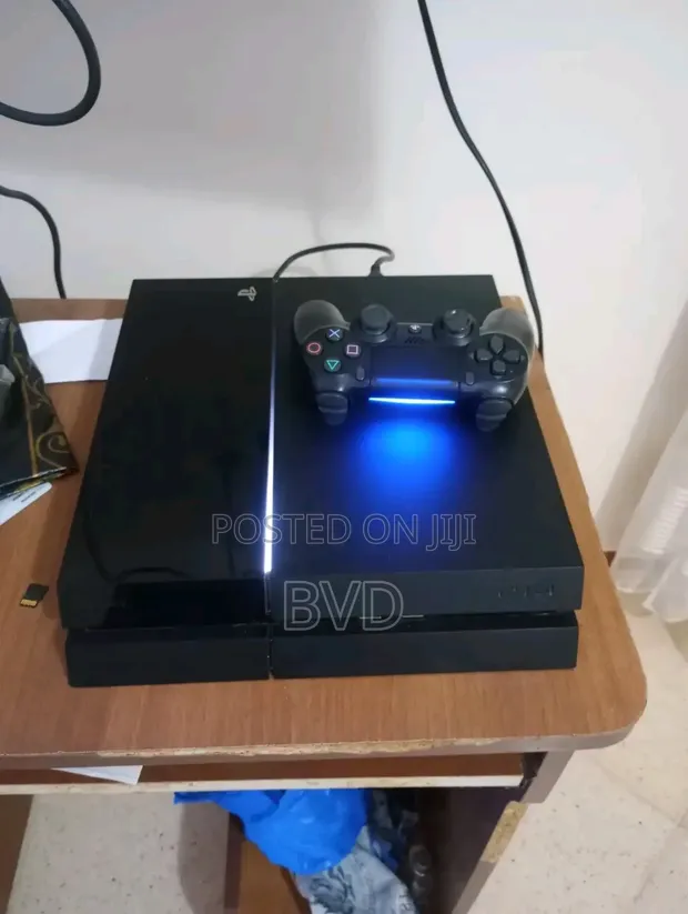 PlayStation 4 with Games - 1