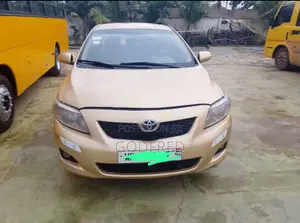 Toyota Corolla Base 2010 Gold Sedan