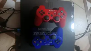 PS3 Slim UK Used with 8 Games