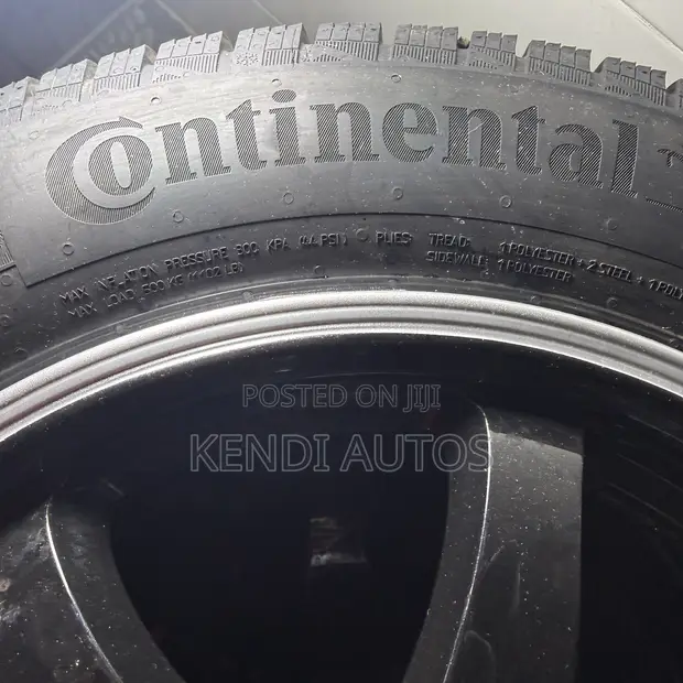 Home Used 15" 4-Hole Rims with New Tires - 1