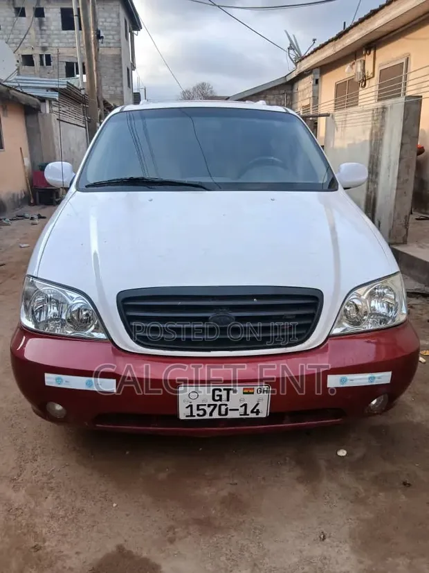Kia Sedona 2005 White - 1
