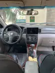 Toyota Corolla 2010 White - 1
