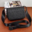 Stylish Black Leather Cross-Body Bag with Skull Pattern - 1