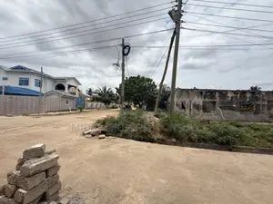 Titled Residential Land for Sale at Spintex with Old Structure