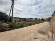 Titled Residential Land for Sale at Spintex with Old Structure - 2