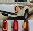 Brand New Smoked Black Tail Lights for Toyota Hilux - 1
