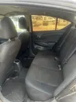 2015 Nissan Versa 1.6 SV Sedan - Brown - 5