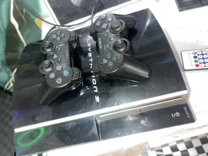 PS3 Standard with 2 Controllers & 5 Games