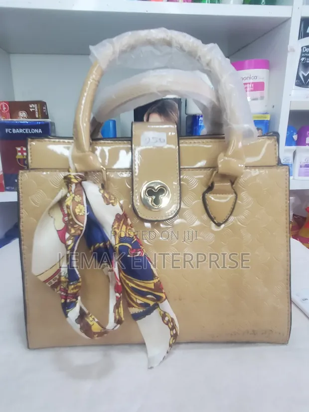Beige Embossed Patent Leather Top-Handle Handbag with Scarf - 1