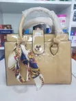 Beige Embossed Patent Leather Top-Handle Handbag with Scarf - 1