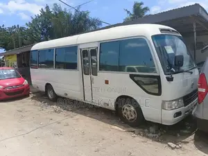 Toyota Coaster 2010 - White