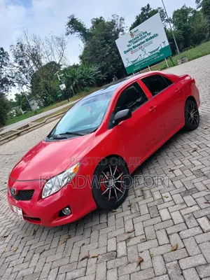 2010 Toyota Corolla LE Sedan - Red