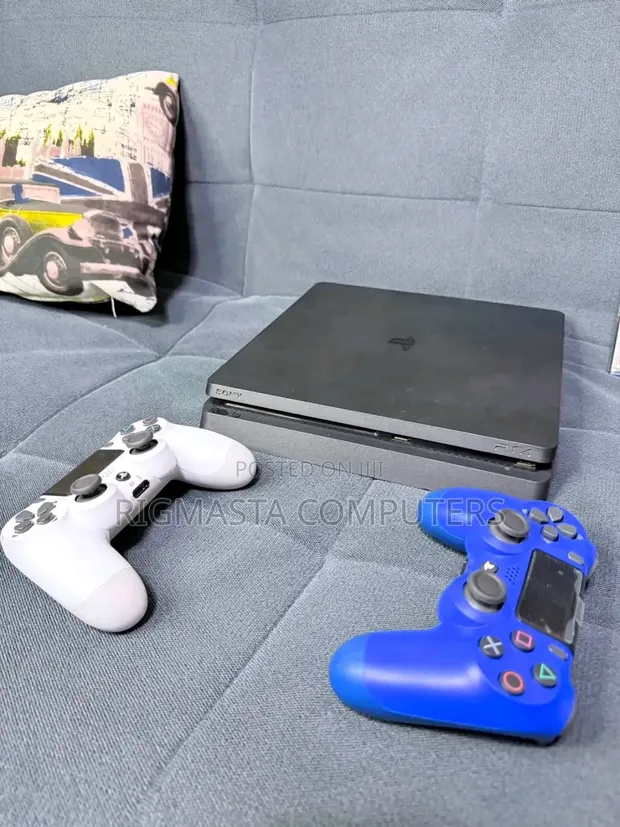 PS4 Slim Console with 2 Controllers & Games - 1