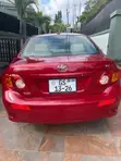 Toyota Corolla 2010 Red - 1
