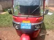 Bajaj RE 2024 Red - 1