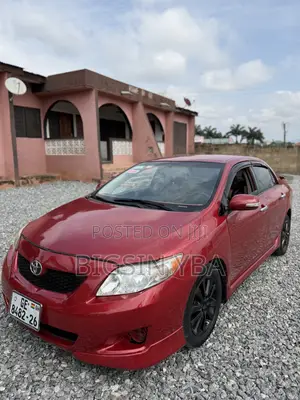Toyota Corolla Base 2010 Red Sedan