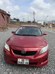 Toyota Corolla Base 2010 Red Sedan - 3