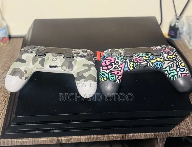 Used PS4 Pro with 1TB Storage and 25 Games - 1