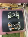 PS3 Slim Console with Two Controllers and Games - 1