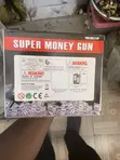 Supreme Money Spray Gun with Fake Dollars - 3