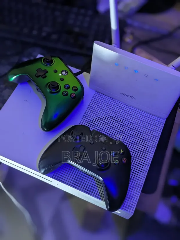 Xbox One S 1TB with 2 Controllers and Games - 1
