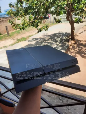 PS4 Standard with FC 24 and 7 Other Games + 2 Controllers