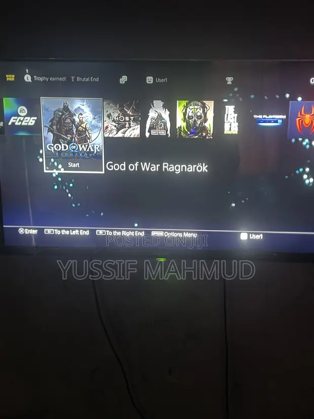 PlayStation 4 Standard with 1 Controller & 10 Games - 1