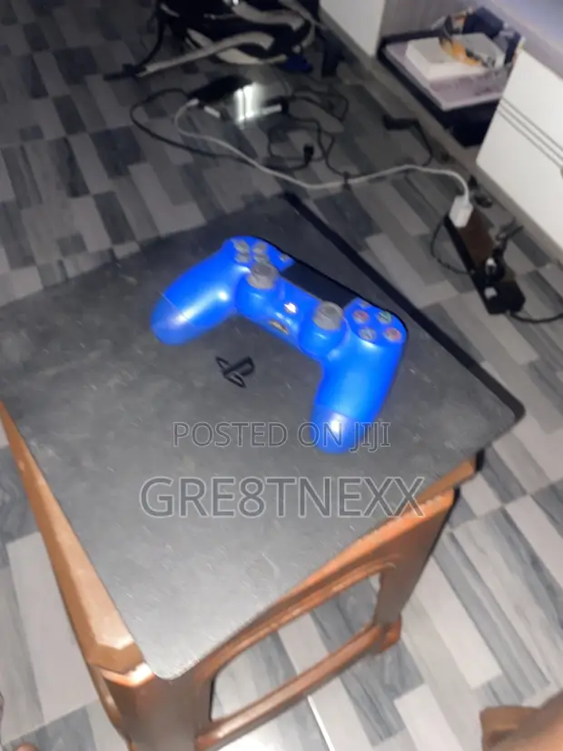PlayStation 4 Slim Console - 1