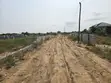 Fully Demarcated 70x100ft Plot in Prampram Layout - 1